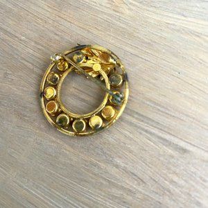 Vintage multicolored rhinestone circle brooch leaf accent Estate Jewelry